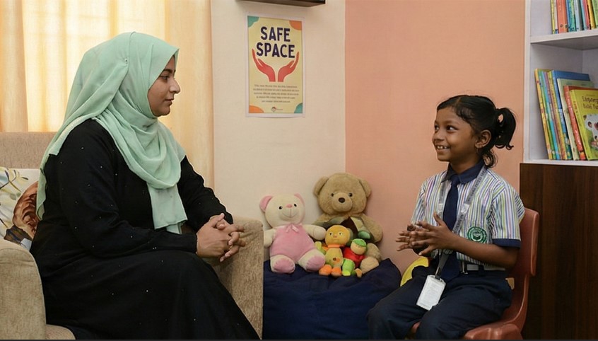 Teacher having a supportive conversation with a student