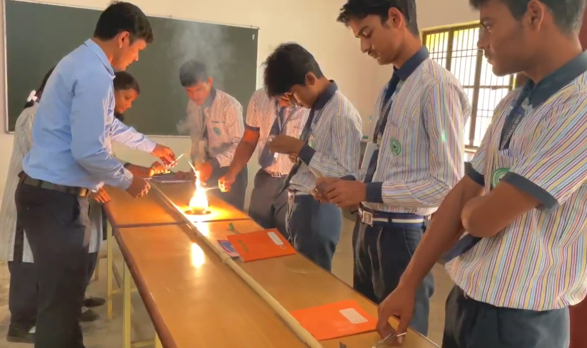 Students working together on a science experiment in the laboratory