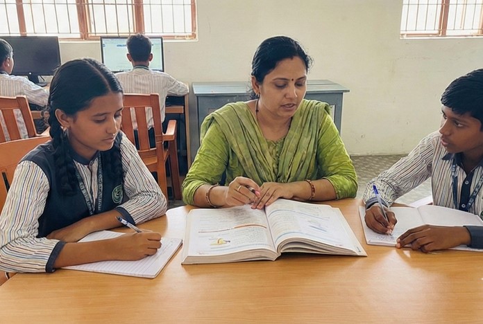 Student actively using reference books and taking notes in the library