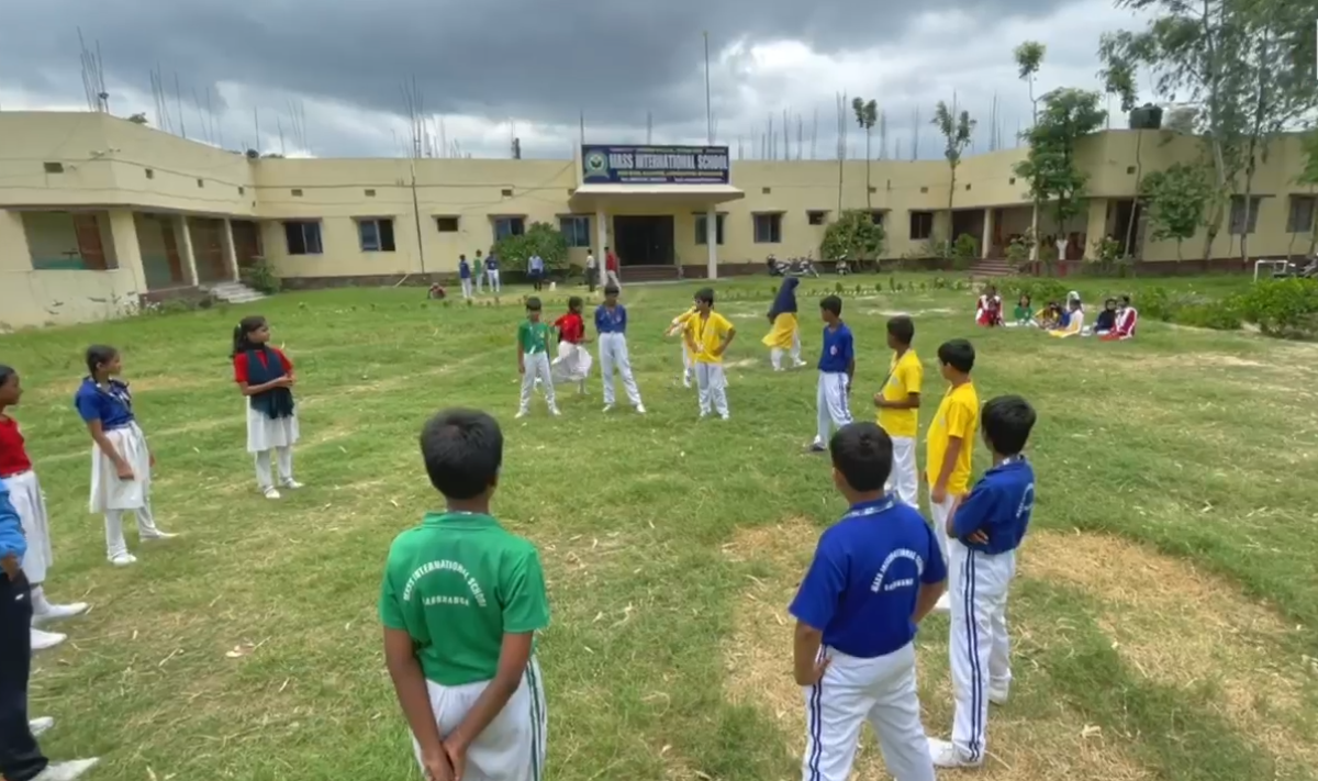 Expansive green sports field for cricket and football